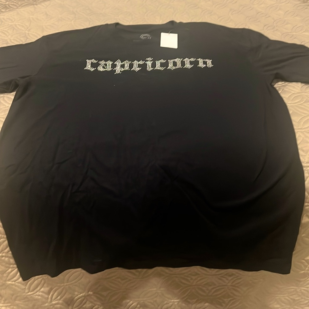 Black short sleeve shirt with cuff. Capricorn. Rhinestone.